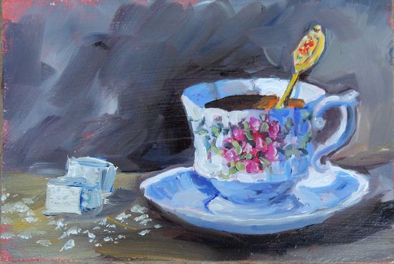 Mug. Still life with the tea cup and sugar.