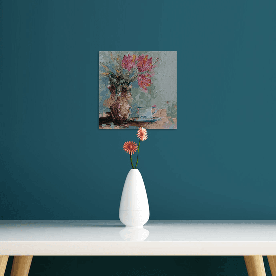 Coffee and tulips on the table