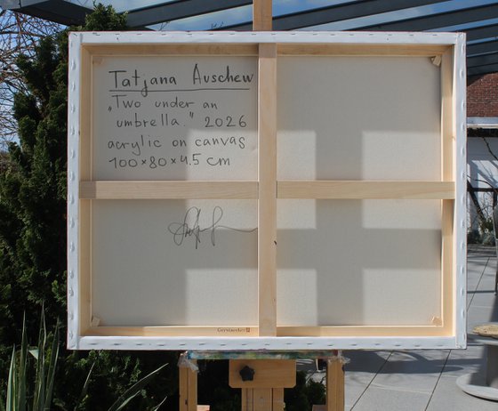 Two under an umbrella.