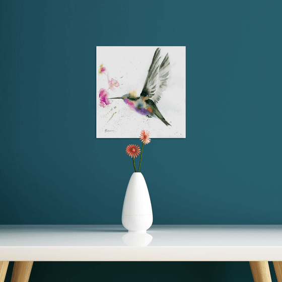 Hummingbird with flower