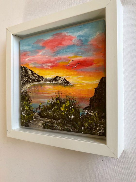 Lulworth Cove in a block frame