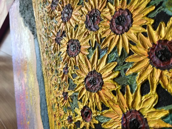 Sunflowers field at sunset