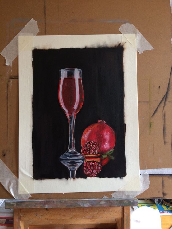 Still life with wine and pomegranate