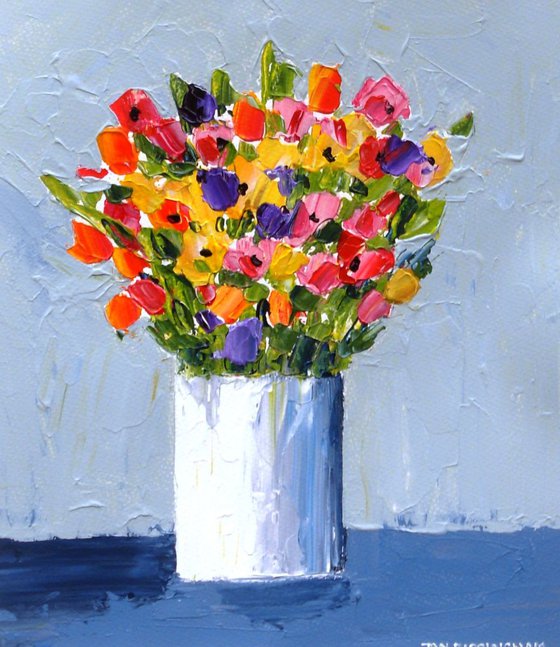 Spring Flowers in a Small White Vase