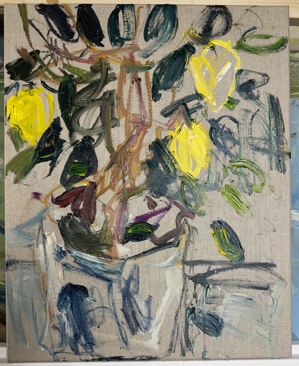 A small lemon tree in a blue pot. by Lilia Orlova-Holmes