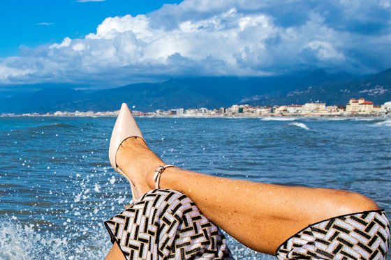 Legs, sea and surfer