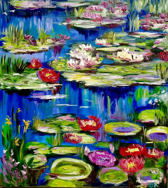 Pond of Claude Monet in Giverny  in summer bloom,  water lilies, irises