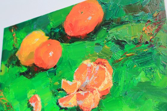 Tangerines on green