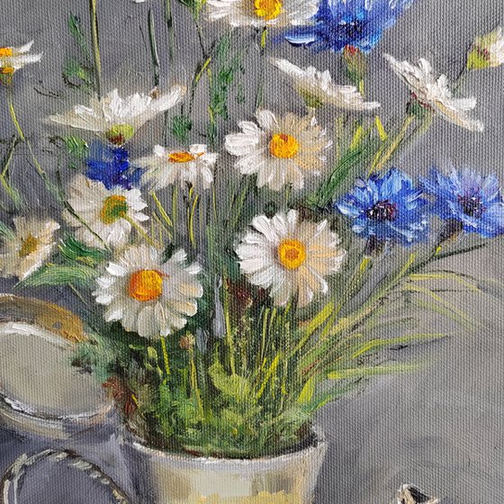 Chamomile and cornflowers bouquet of wild flowers