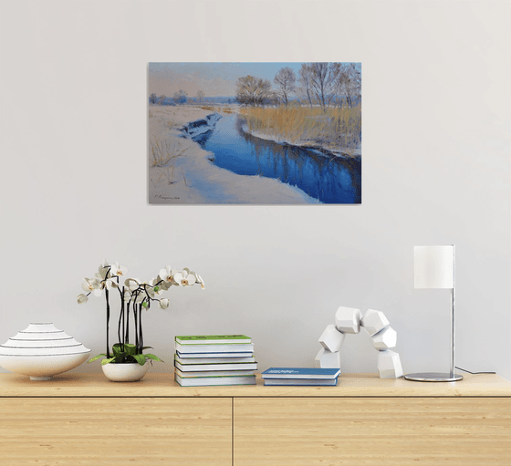 In winter, by the river