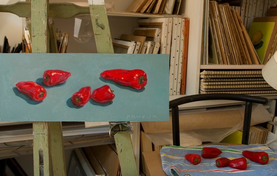 modern still life of red peppers