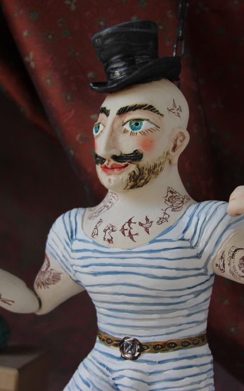 Vintage Strongman with zylinder hut. Wall sculpture by Elya Yalonetski. by Elya Yalonetski