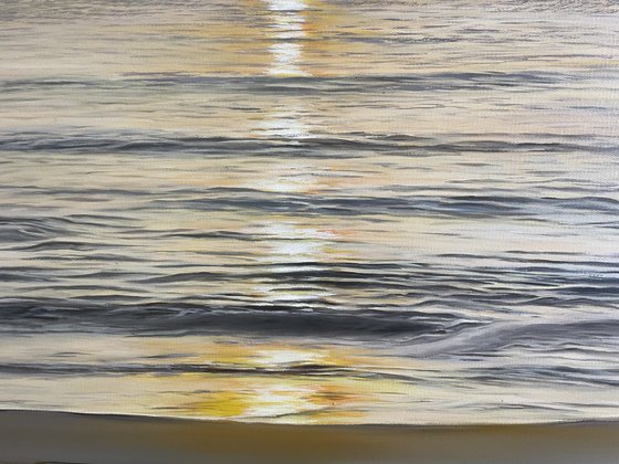 Golden Sunrise Over Calm Ocean