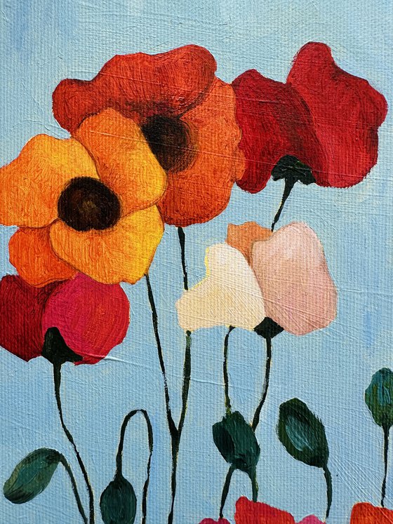 Poppies on Blue