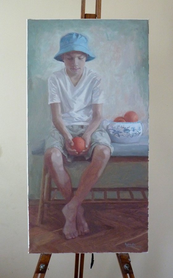 Boy with oranges