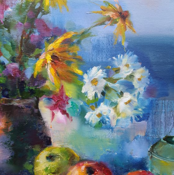 Red apples on blue