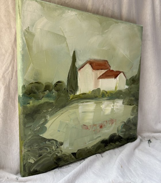 Toscana hills white houses with lake.