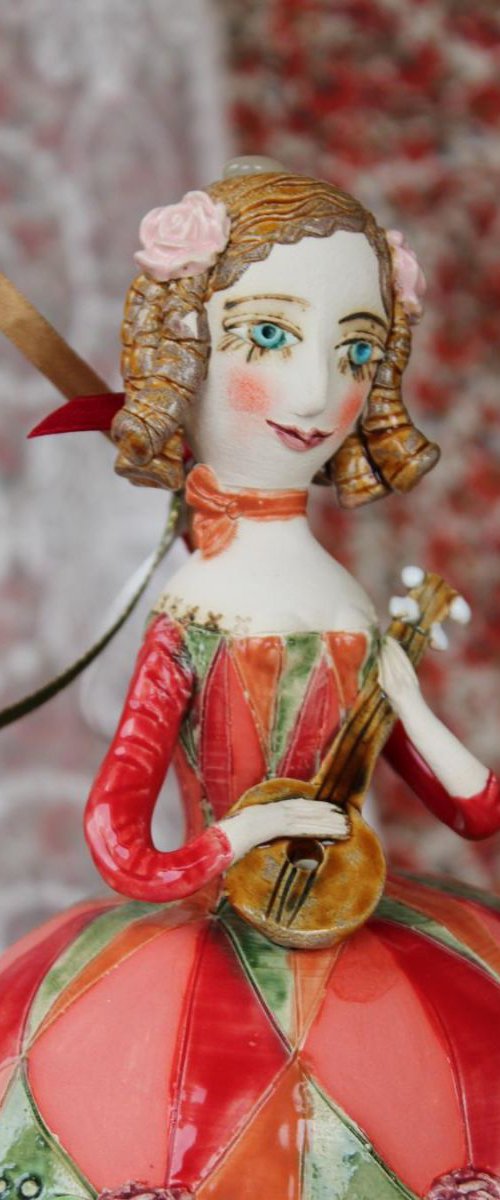 Girl with a mandolin. Sculptured bell-doll by Elya Yalonetski
