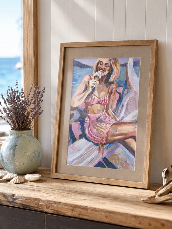 Girl with ice cream in Pink Swimsuit on Beach