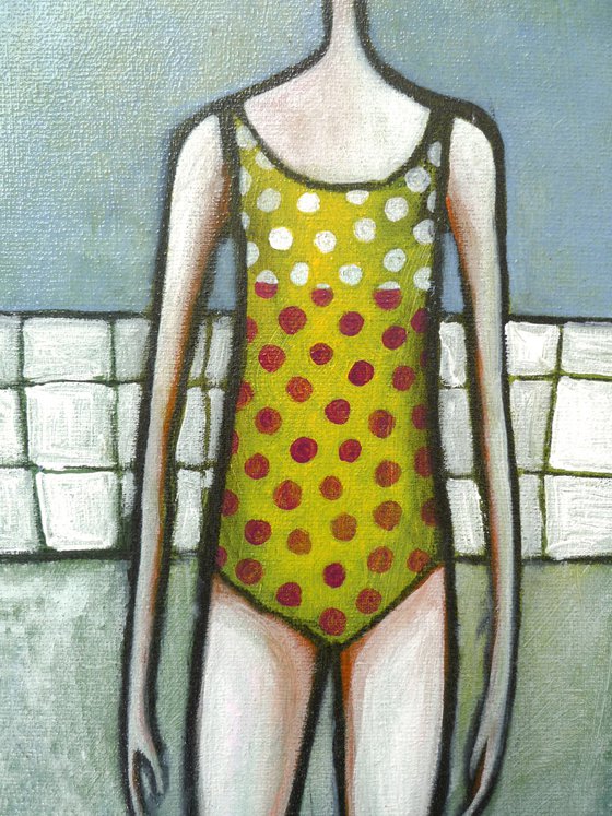 Girl in a polka dot bathing suit
