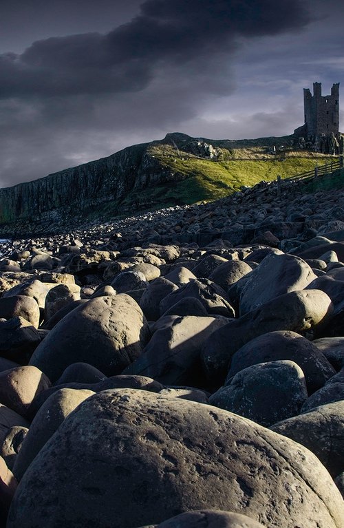 beach boulders in Northumberland by DAVID SLADE