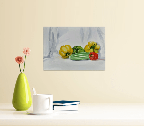 Still life with bell peppers and cucumber