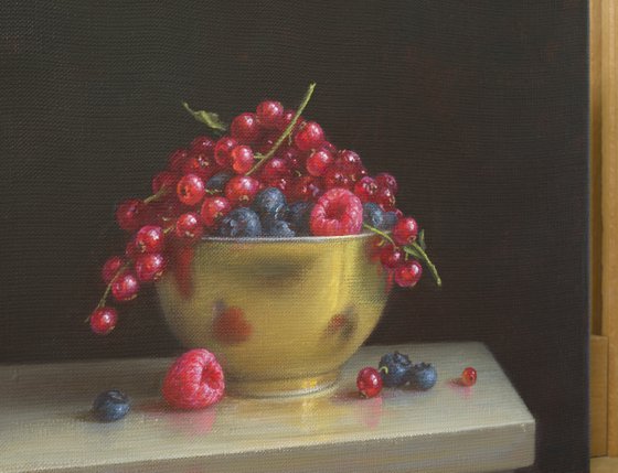 Berries in a golden bowl