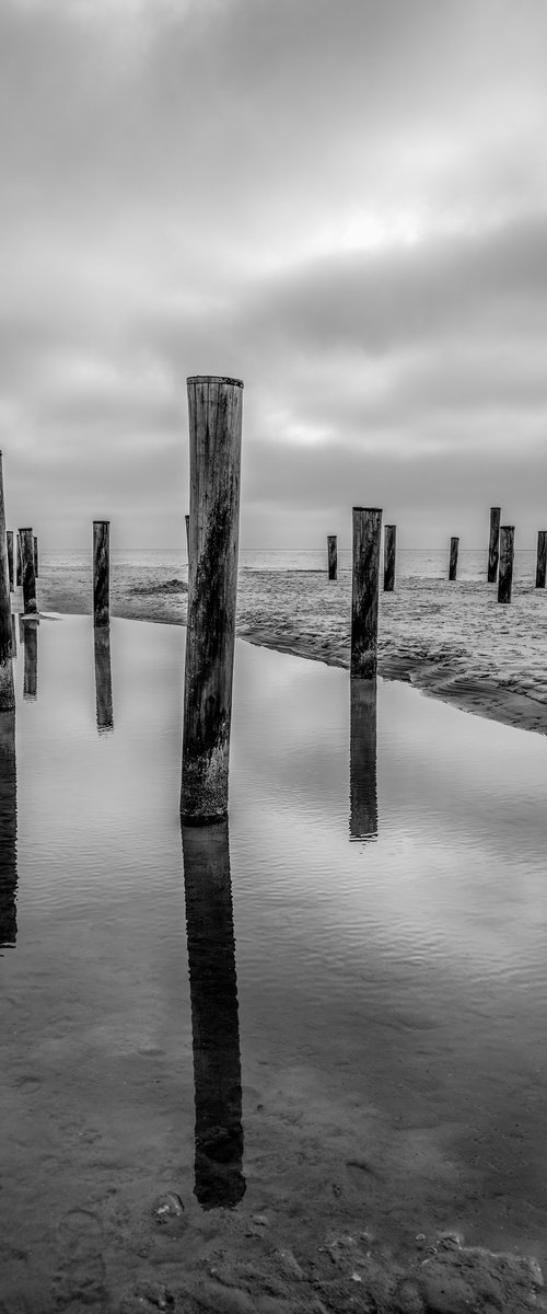 THE POLES ON THE BEACH by Fabio Accorrà