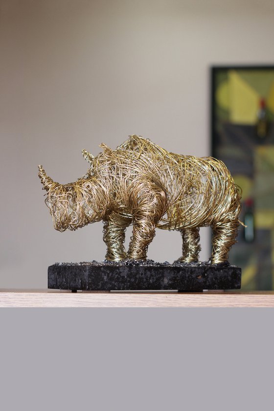 Golden rhino (20x30x12 2.9kg iron, brass, tufa)