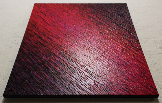 Red iridescent purple knife texture