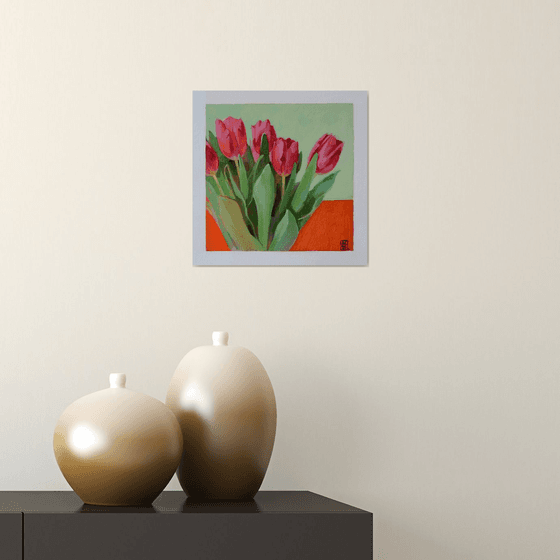 pink tulips with leaves