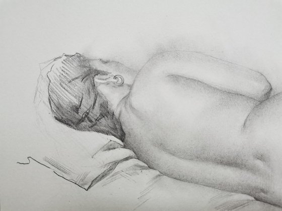 The woman lying on the sofa
