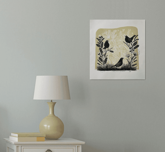 Three Curious Blackbirds