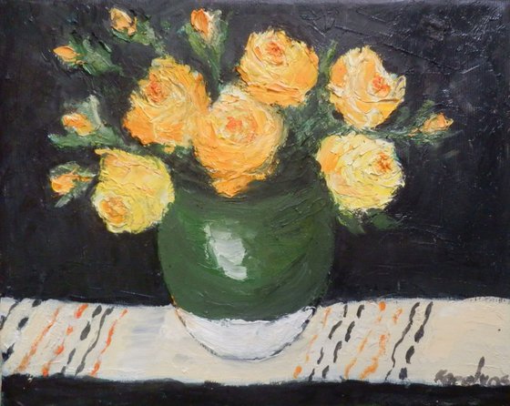 Yellow roses in a green bowl