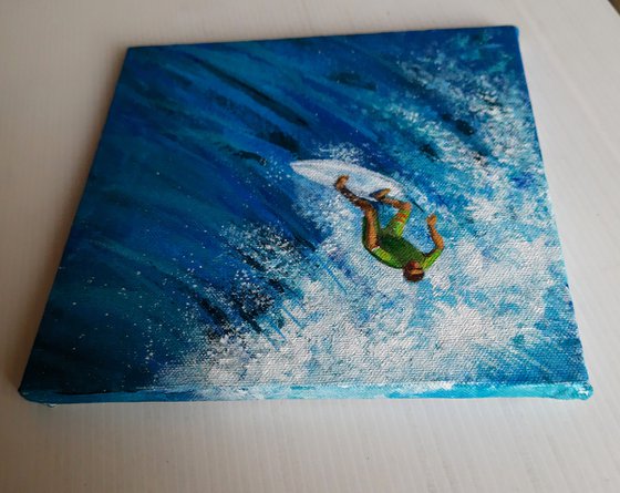 Surfer in the blue sea 4
