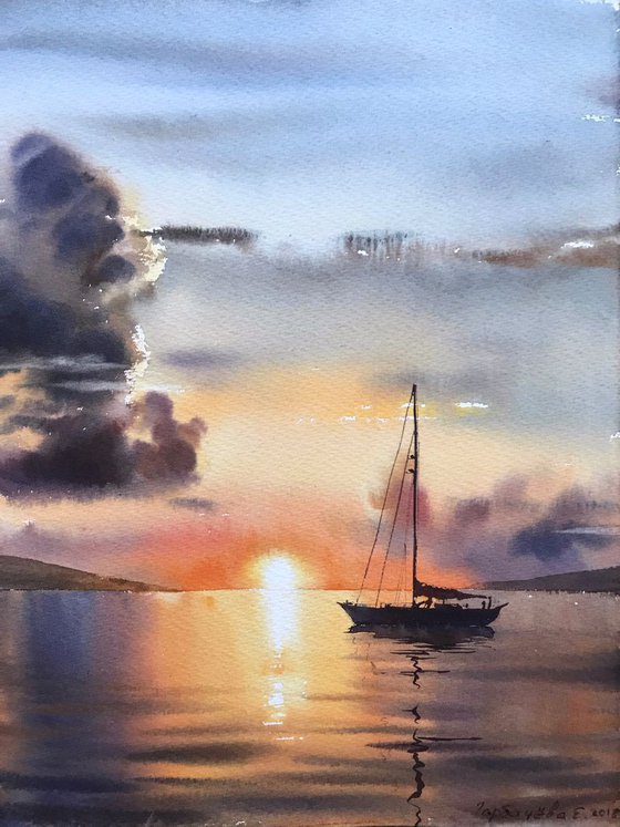 Sailing yacht and fire sunset