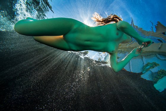 The Real Mermaid - underwater photo of naked young woman in sunbeams - print on aluminum