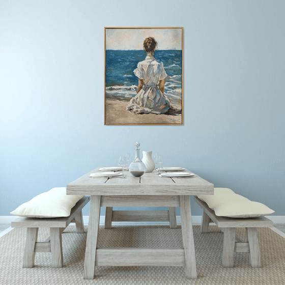 Woman by the ocean.
