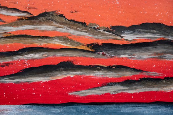 Coral sky and ocean wave