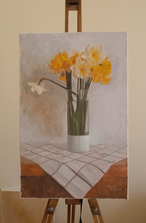 Yellow daffodils in a glass vase