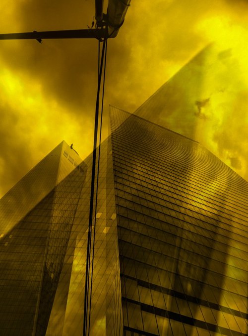 yellow skyscraper by Daniel Fontaine