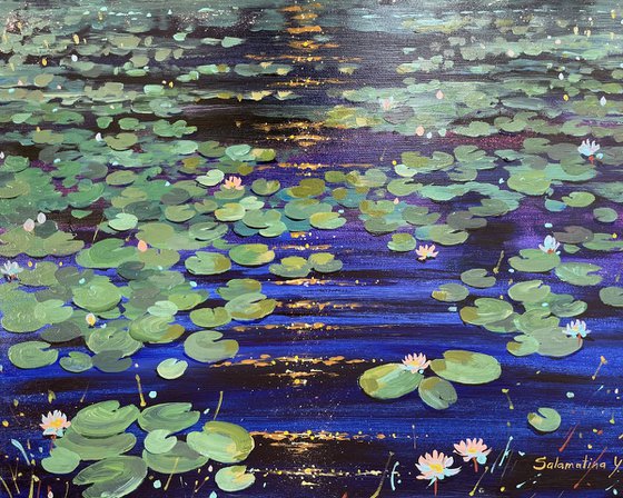 Water lilies. Night and glow on the lake