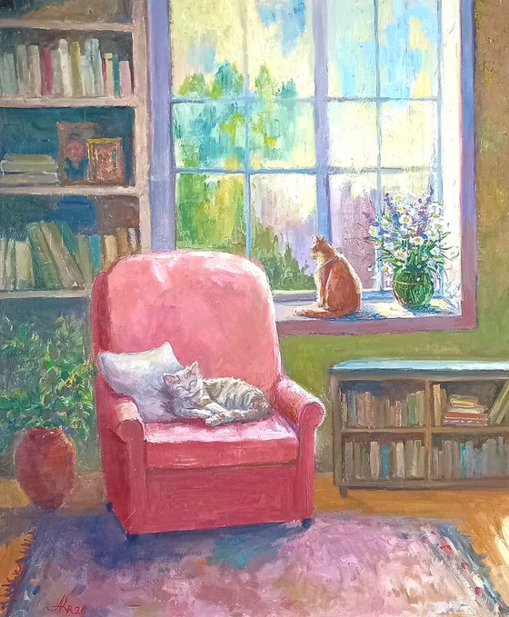 Ginger cat and armchair