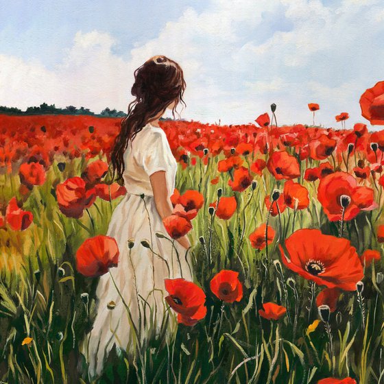 Woman in a red poppy field