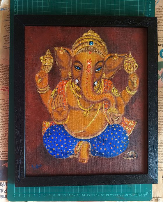 Lord Ganesh with blue eyes