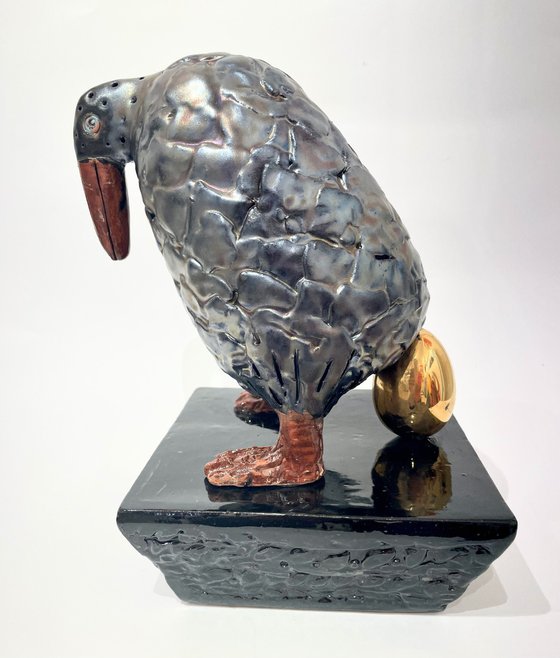 Black Bird with Golden Egg