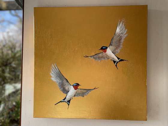 Two Swallows on Gold