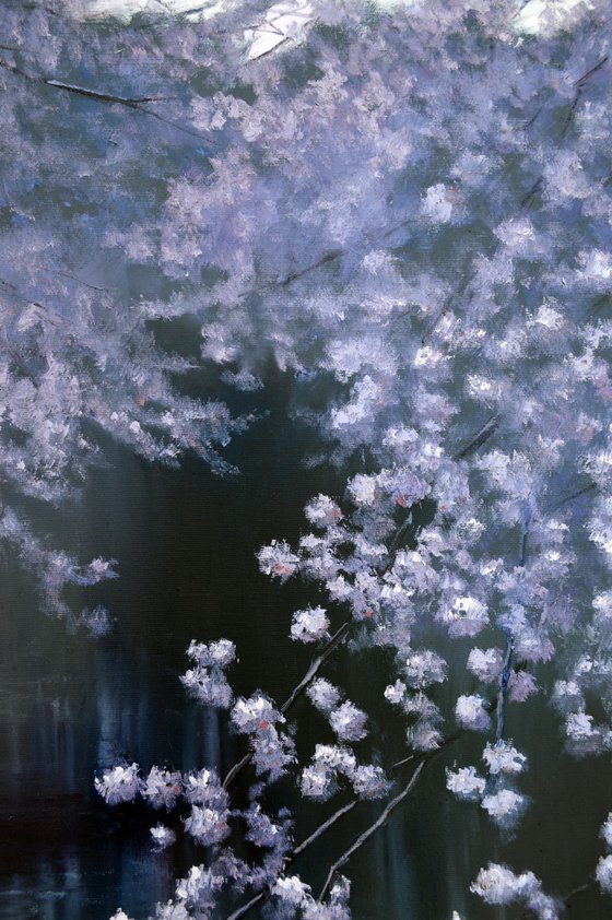 Blooming garden by the pond