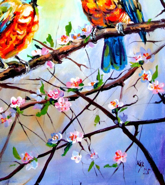 Birds with flowering branch