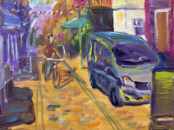 Festive Dutch town scene with cyclist